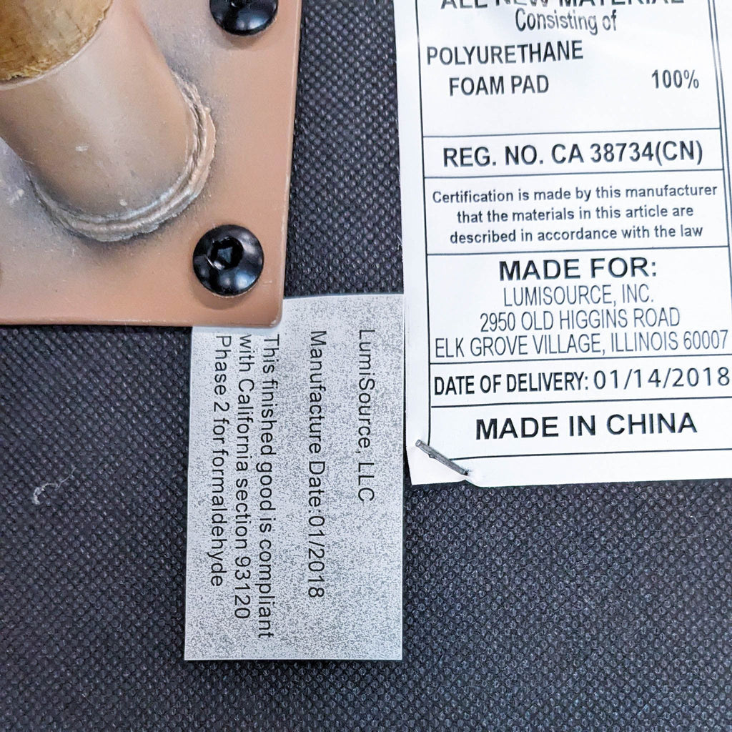 Close-up of the LumiSource chair label with manufacturing details.