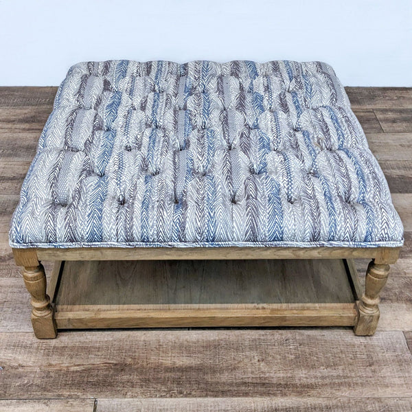 40" square Motif Design ottoman with a tufted cornflower blue herringbone top and weathered oak frame.