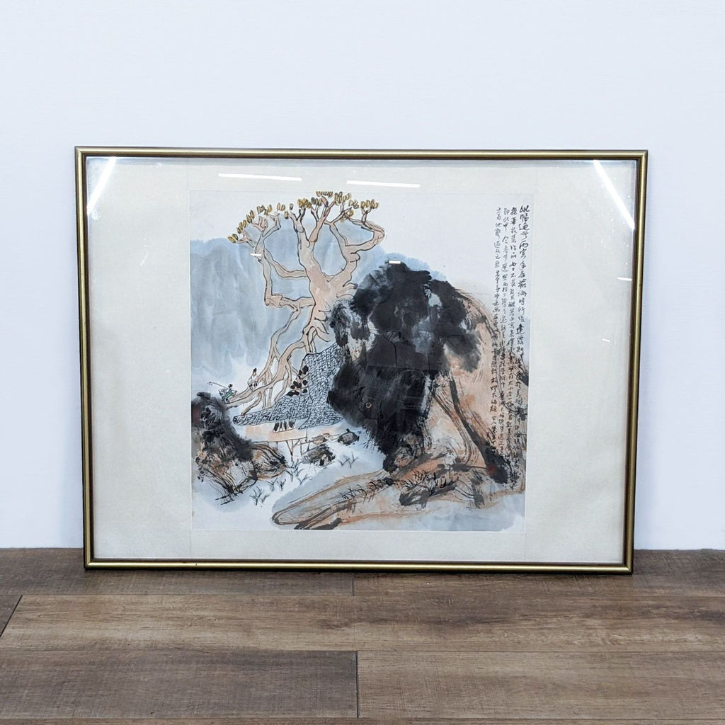 Framed ink art depicting serene Asian landscape with detailed nature scenes.