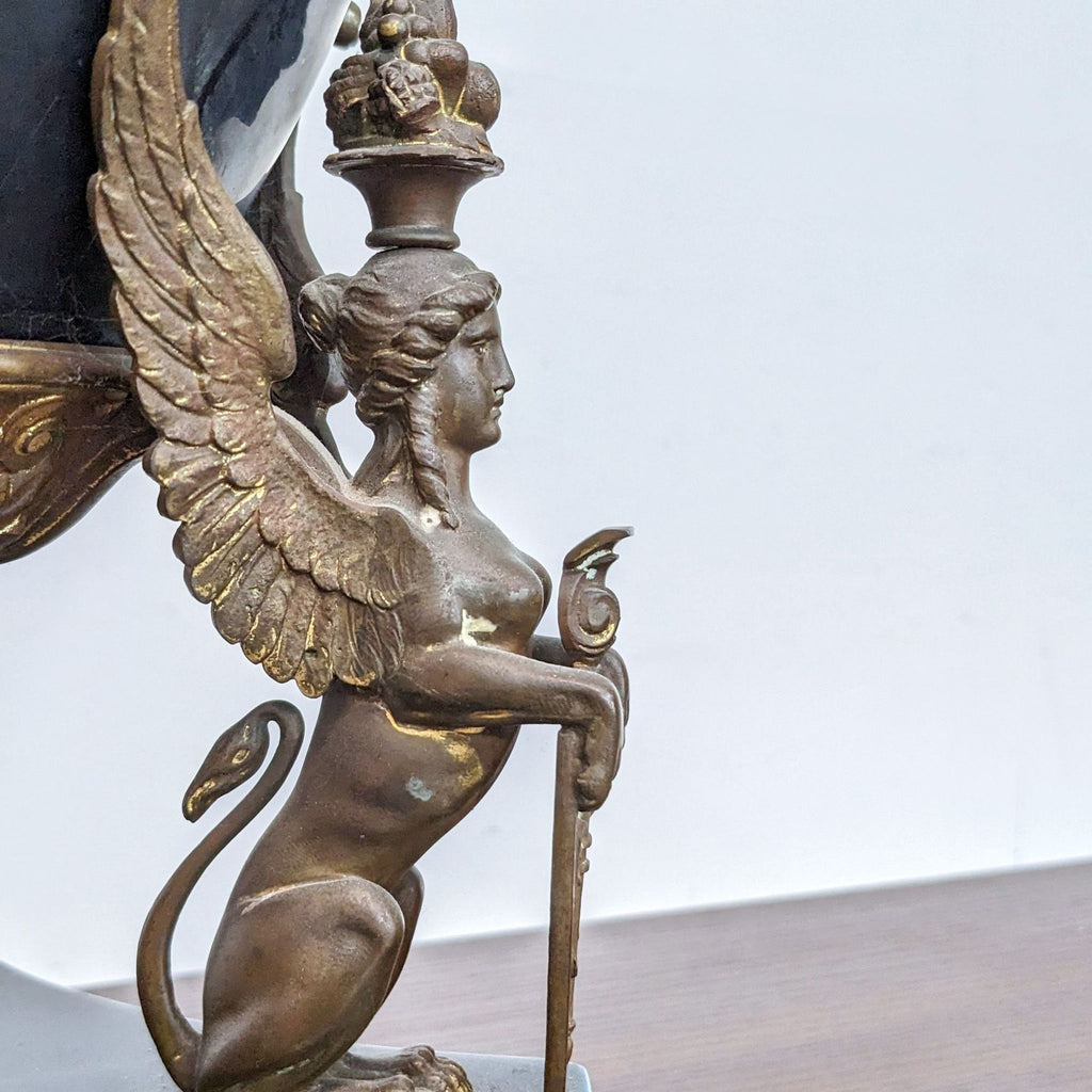 a french gilt bronze and marble table clock