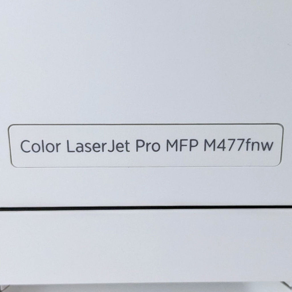 HP Color LaserJet Pro MFP M477fnw model label on a printer.