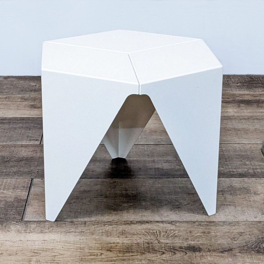 Vitra Prismatic Side Table, hexagonal white top, three aluminum folded legs.