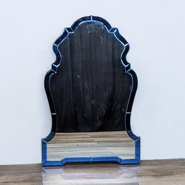 Blue beveled mirror with a classic silhouette from Mirror Image Home.