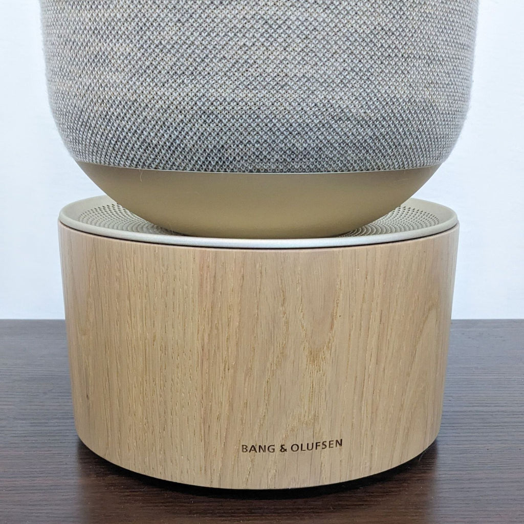 Close-up of Bang & Olufsen's Beosound Balance, featuring elegant tactile materials.