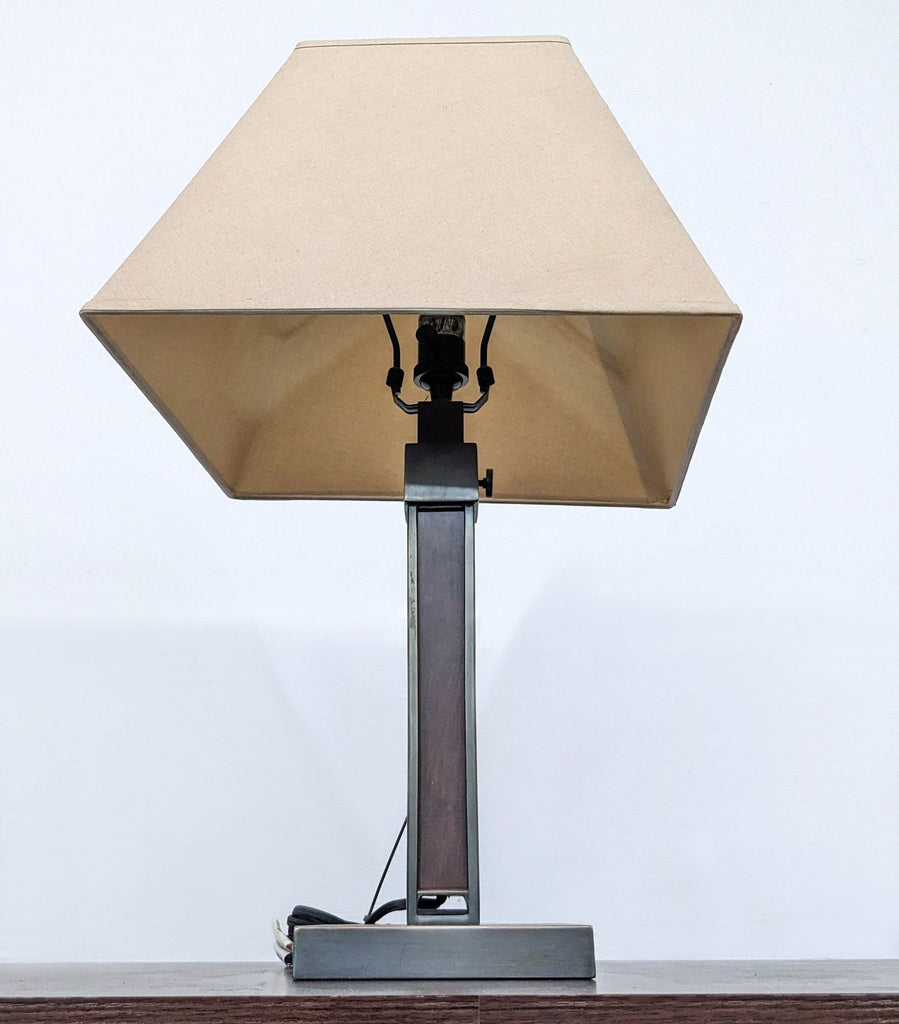 Close-up of Reperch lamp, showcasing beige shade and sturdy base.