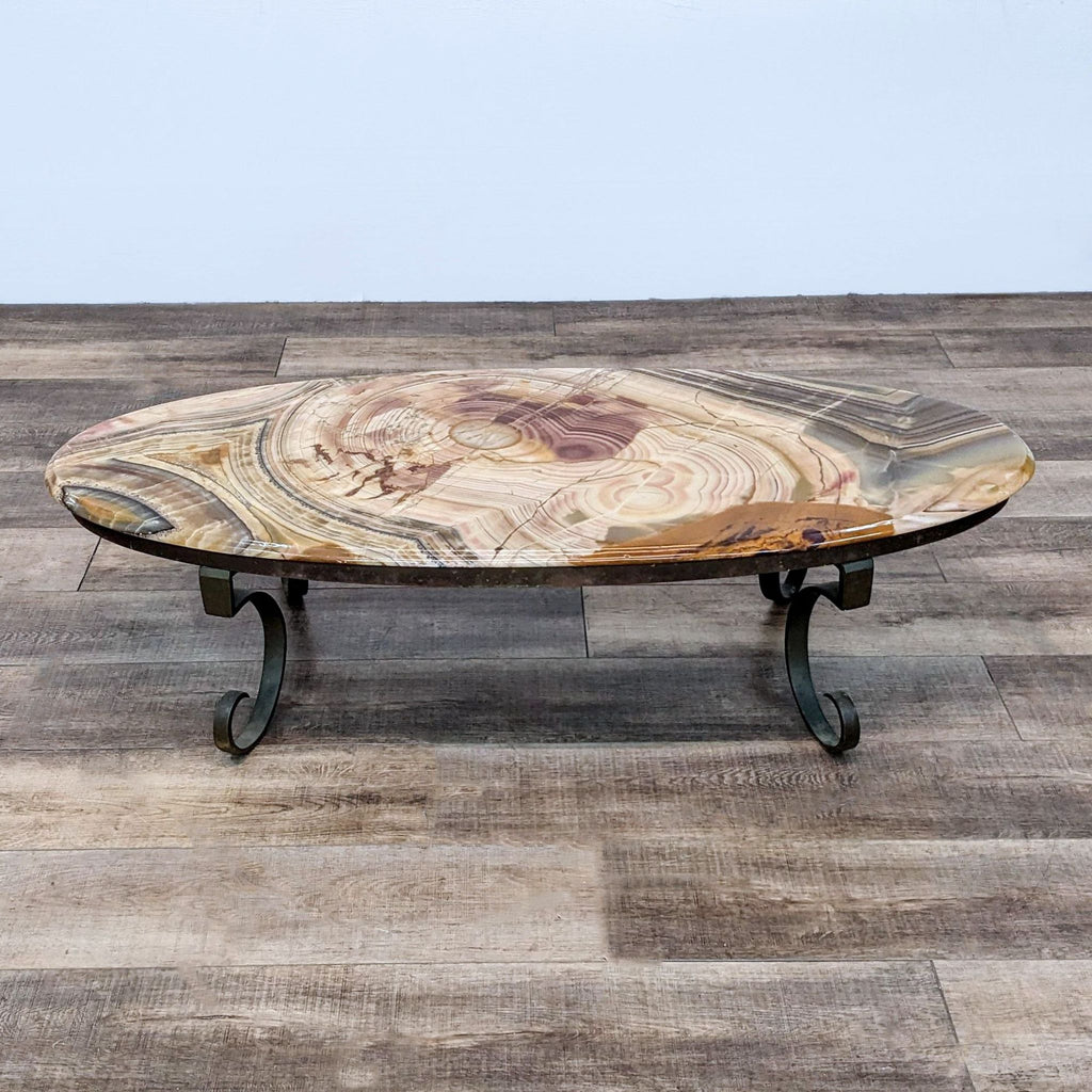 Reperch brand coffee table with multicolored circular top on wrought iron base, Made in Mexico.