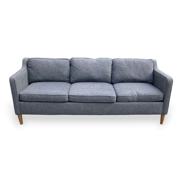 West Elm Hamilton sofa with narrow arms and wooden feet, inspired by 1950s design.