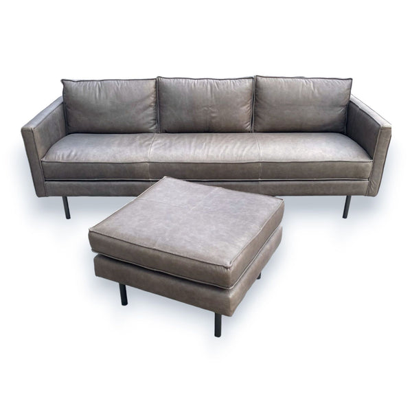1. West Elm Axel Reversible Sectional Sofa with minimalist design, leather upholstery, and metal legs, displayed with a separate ottoman.