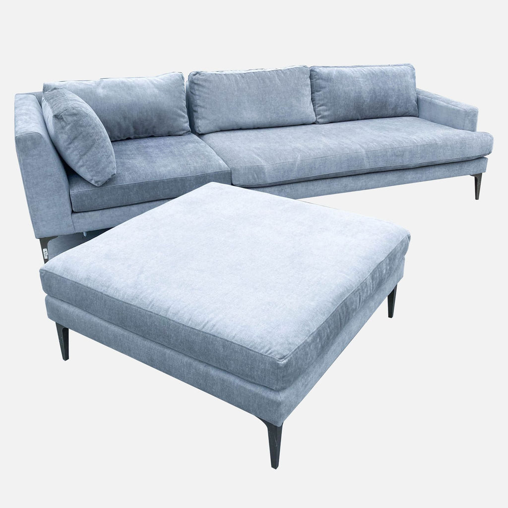 a couch with a couch cushions and a table 
