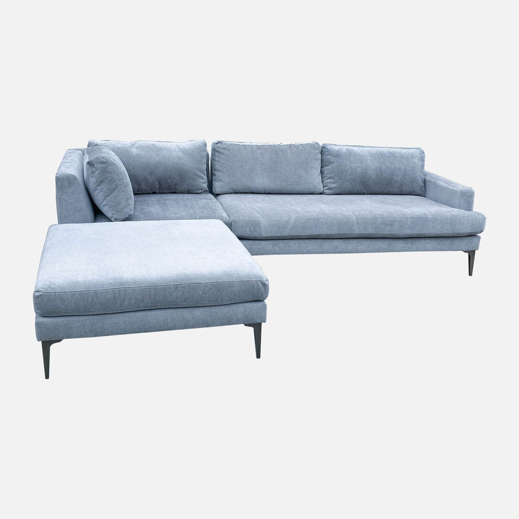 a couch with a couch cushions and a lamp 