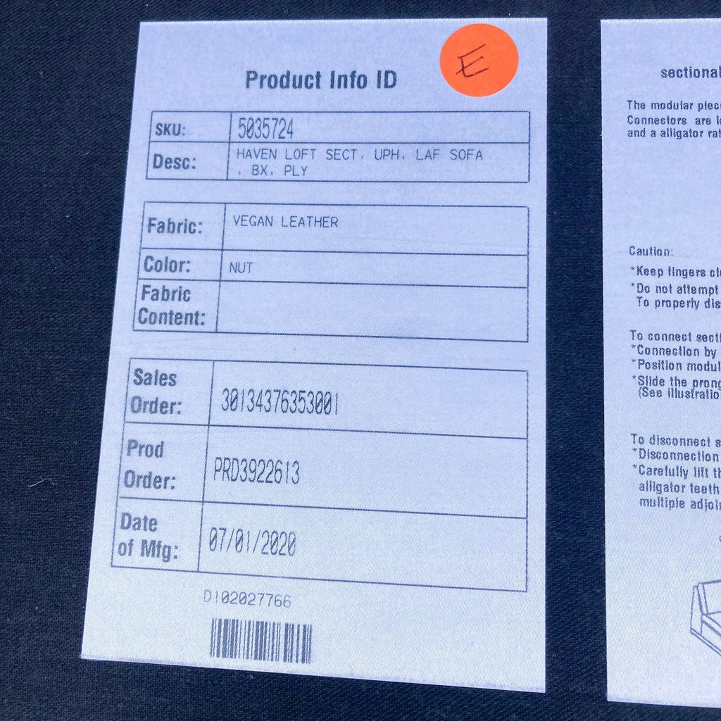 Alt text 2: Close-up of product label showing SKU and description for West Elm vegan leather sectional.