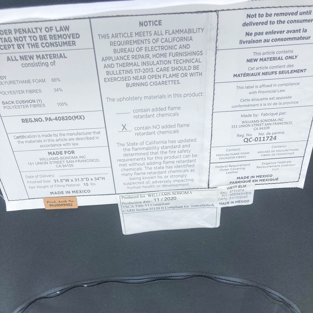 Law label on West Elm Axel chair showing materials, compliances, and flame retardant notices.