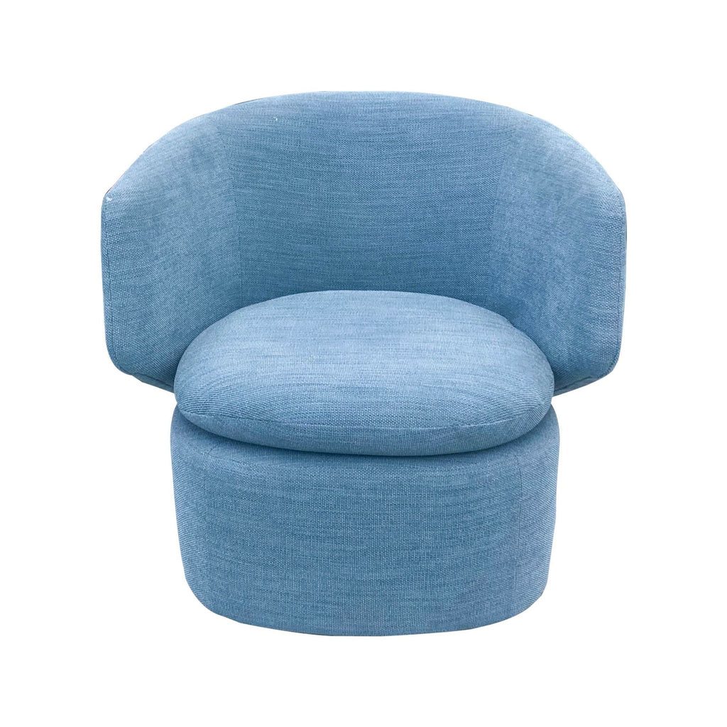 West Elm Crescent lounge chair in ocean blue performance weave fabric, front view showing its rounded modern shape.  