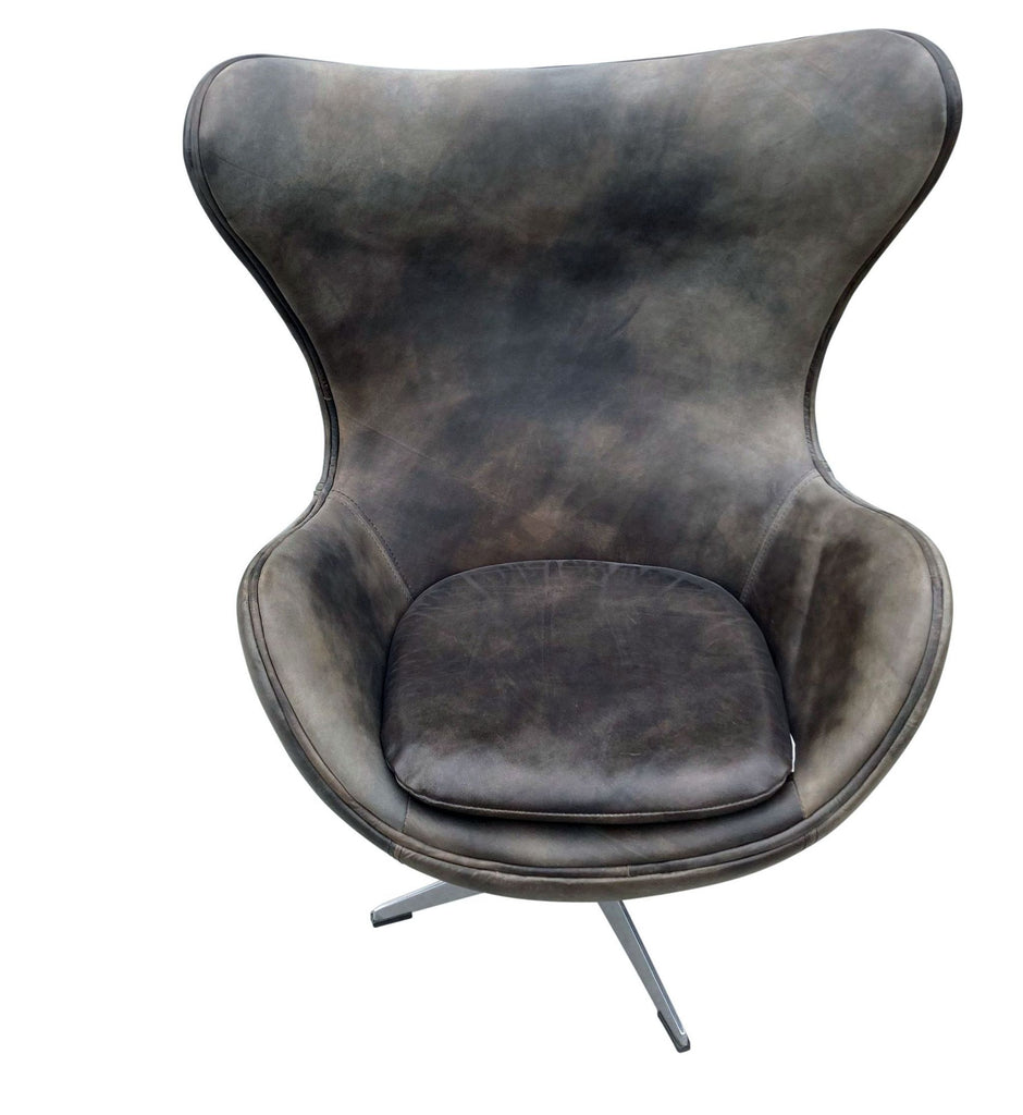 3. "Reperch brand swivel lounge chair in dark brown leather, featuring a comfortable seat and a unique curved design, on a metal base."