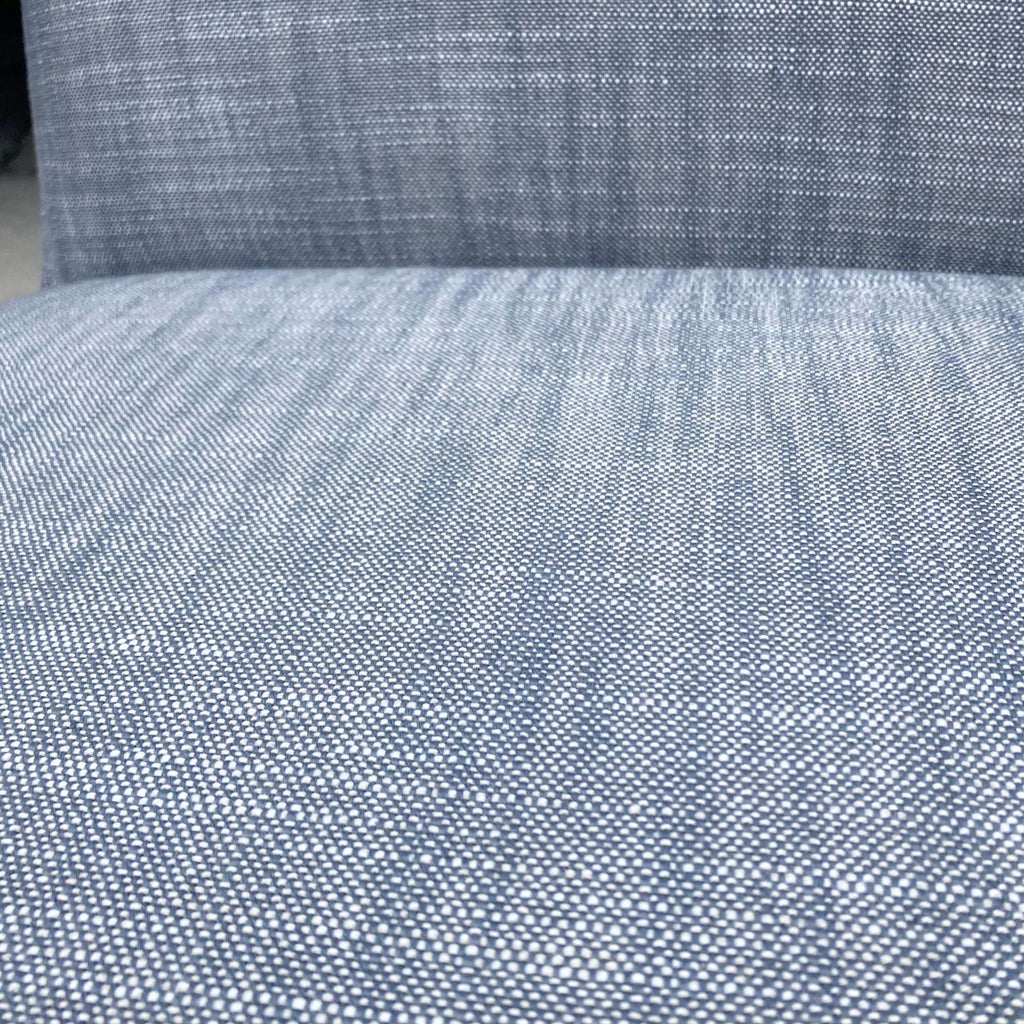 2. Close-up of the textured upholstery on a West Elm Show chair, highlighting the quality of the fabric.