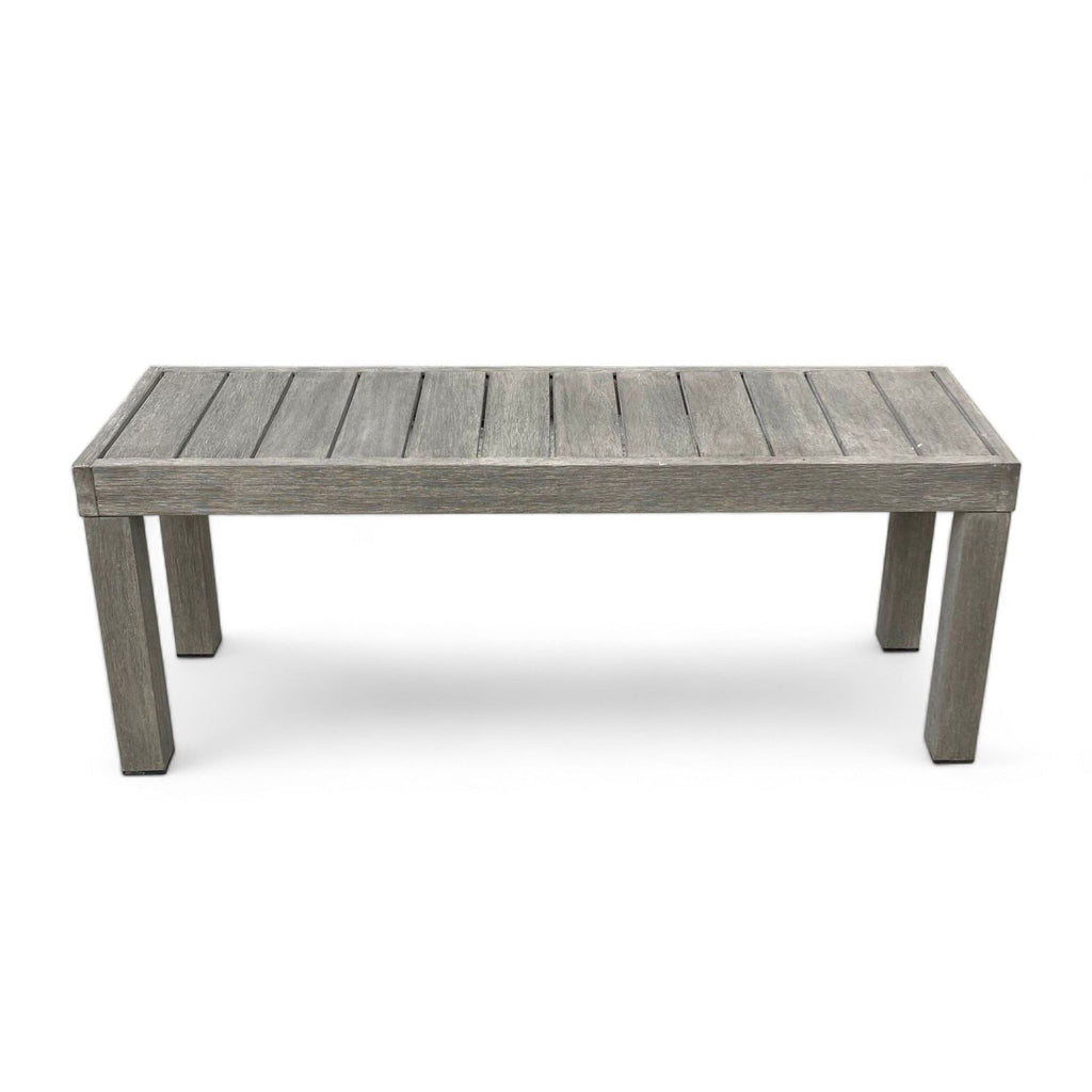 Wooden bench from Ottomans & Benches, with slatted seat design and simple legs, isolated on a white background.