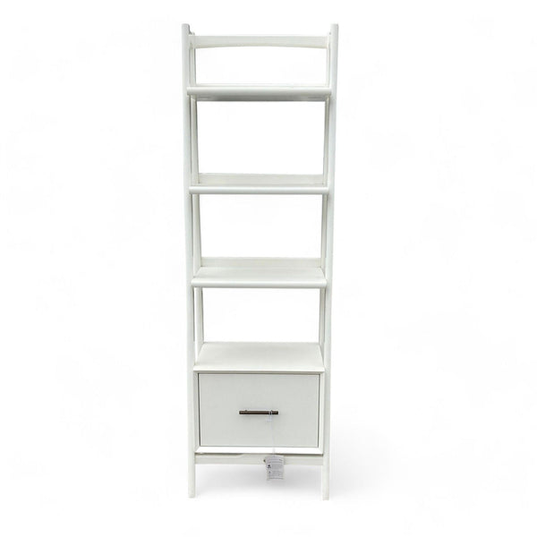 West Elm branded white bookshelf with a single drawer and four shelves on a white background.