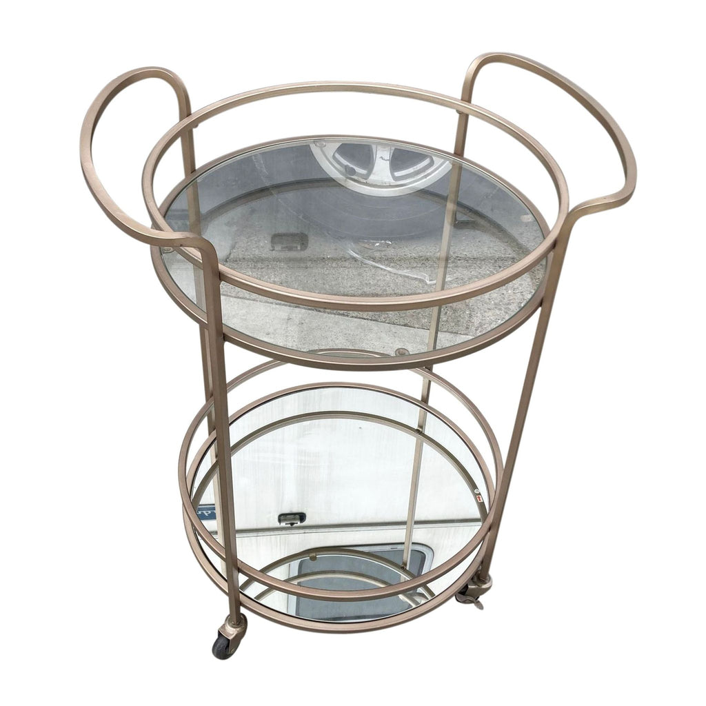 a small metal basket with a small metal basket on top 