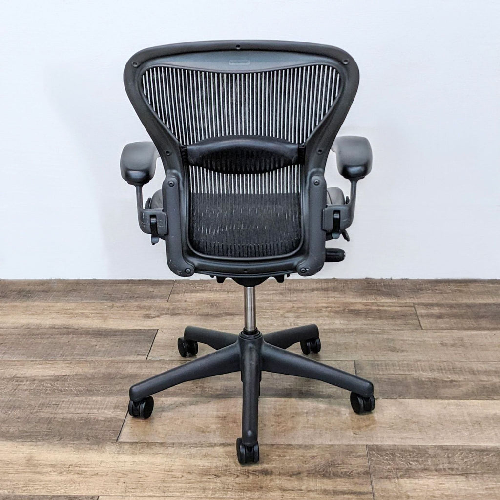 a chair with a black chair frame and a black chair 