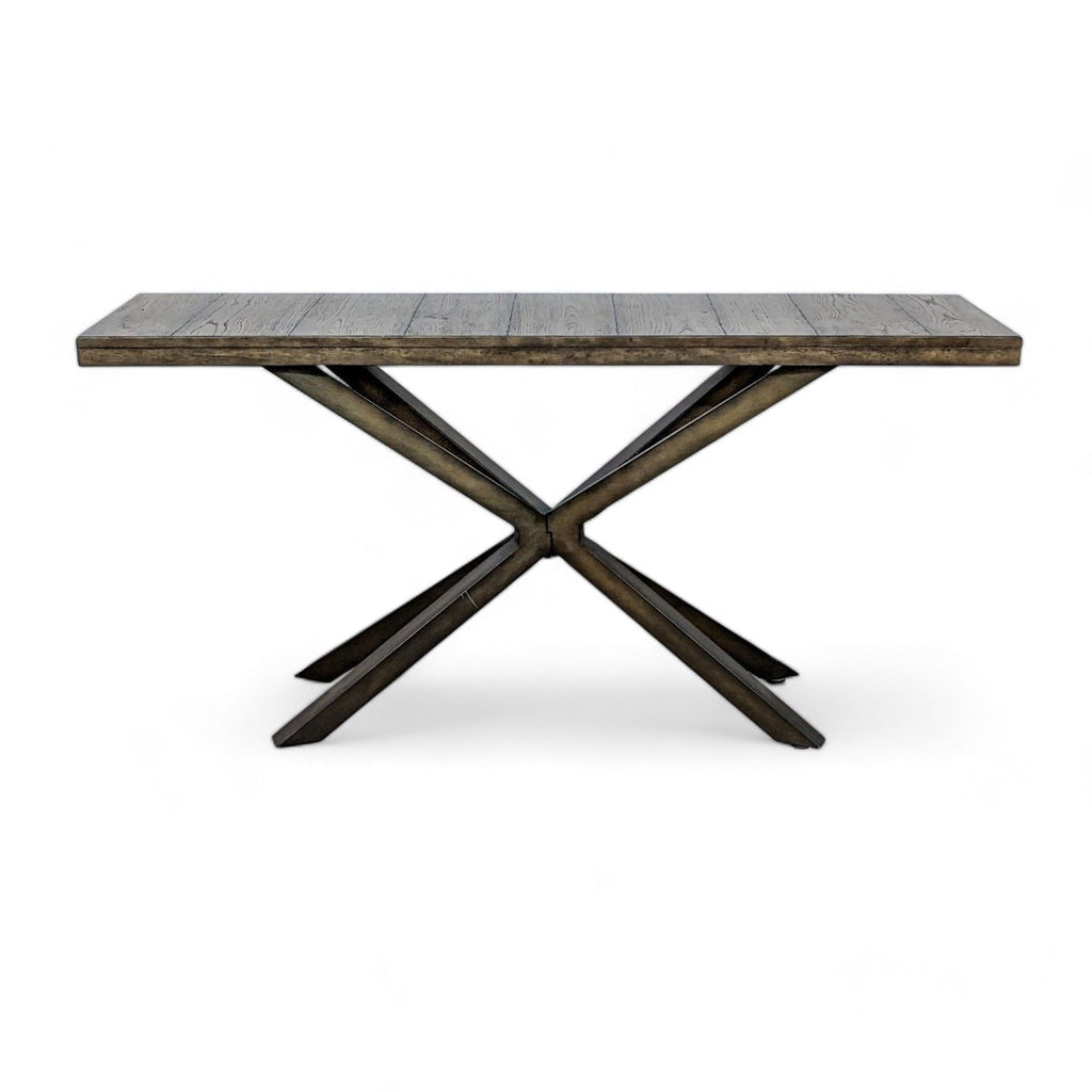 Reclaimed wood top console table with double X metal base by Pottery Barn, isoalted on white background.