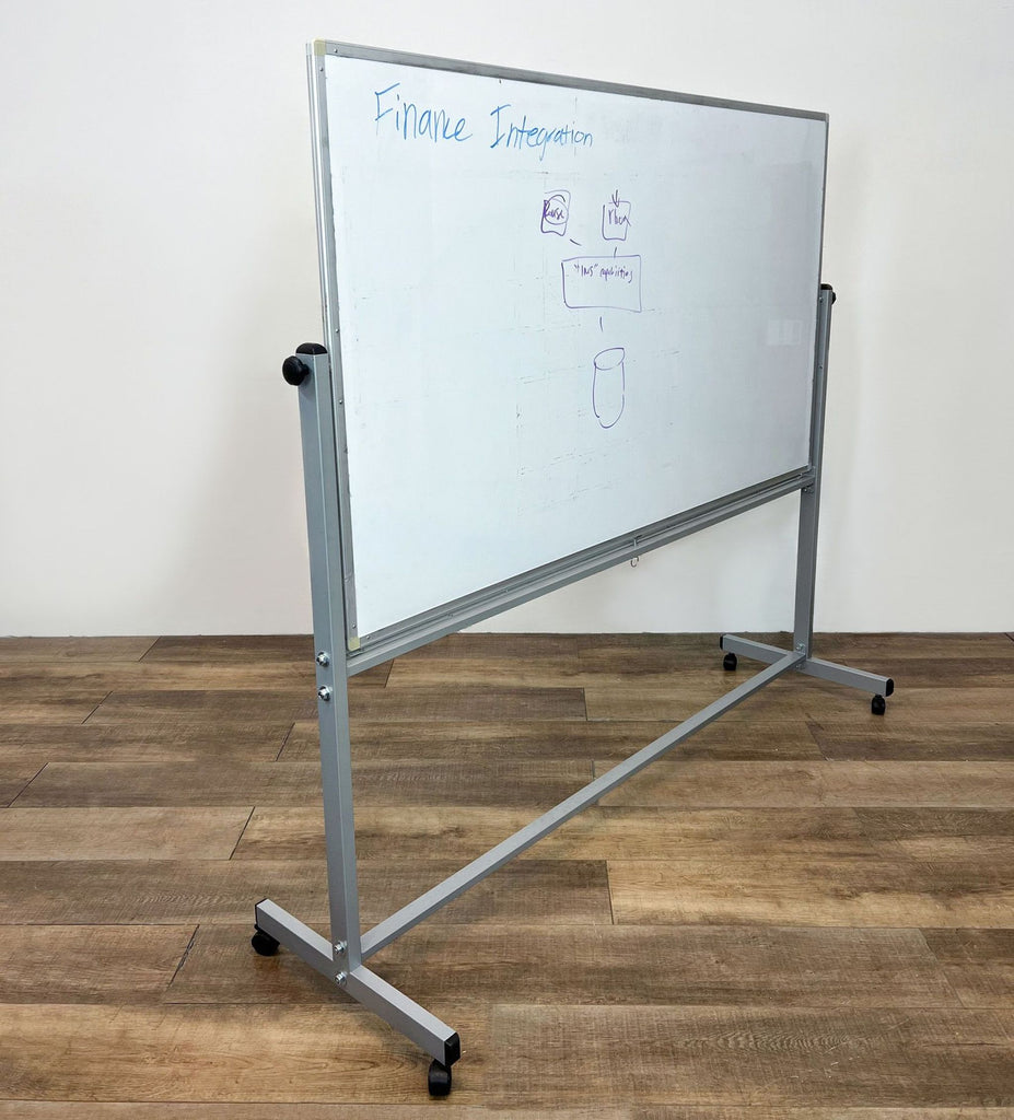 2. A Reperch magnetic whiteboard featuring residue from past use, standing on a wooden floor with a sturdy frame and caster wheels for mobility.