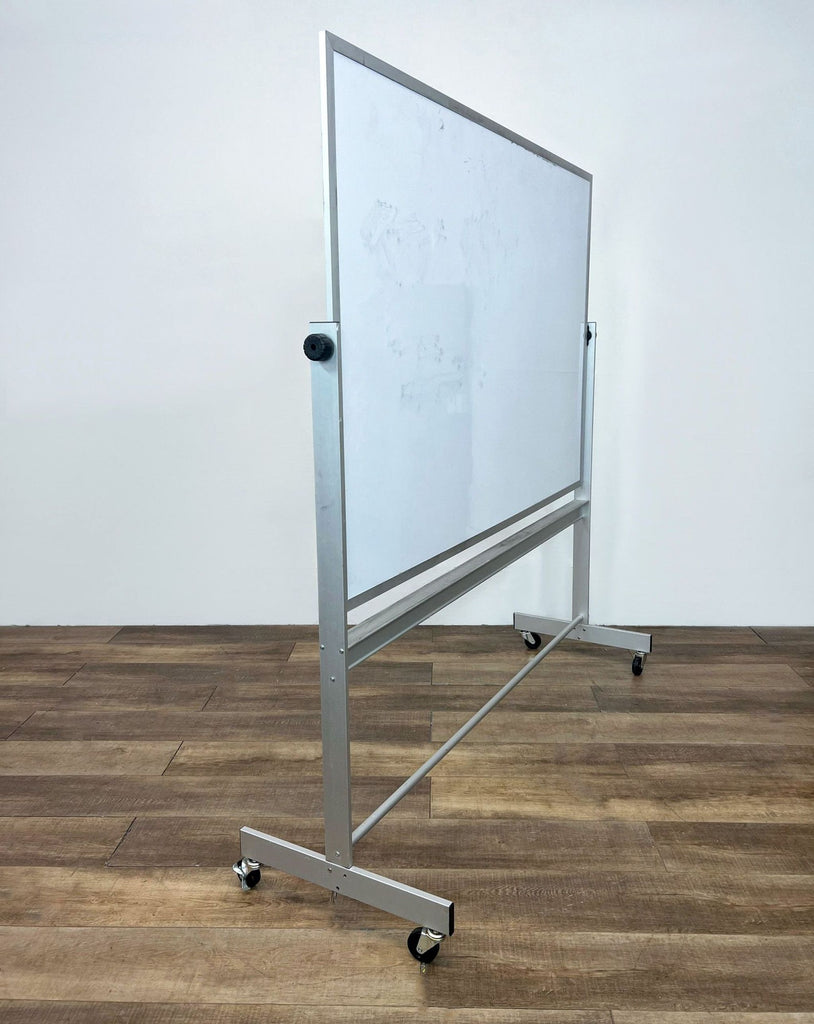 Side view of a magnetic whiteboard with a mobile steel frame on wheels.