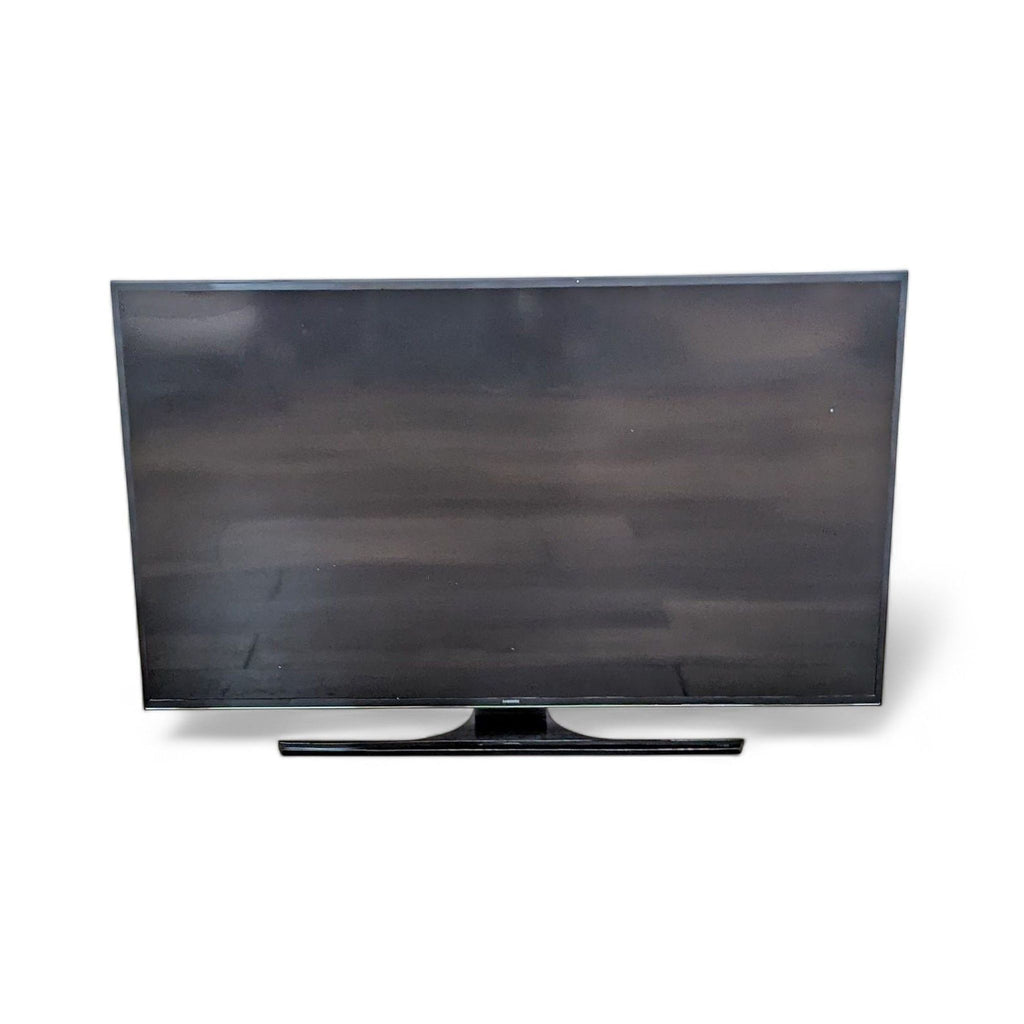 3. Frontal view of a Samsung Full HD Smart TV with a slim design, turned off and placed against a white background, ideal for any room.