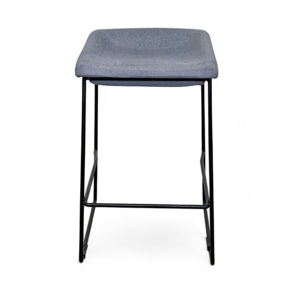 1. Modern EQ3 brand stool with a gray cushion and black metal frame on a white background.