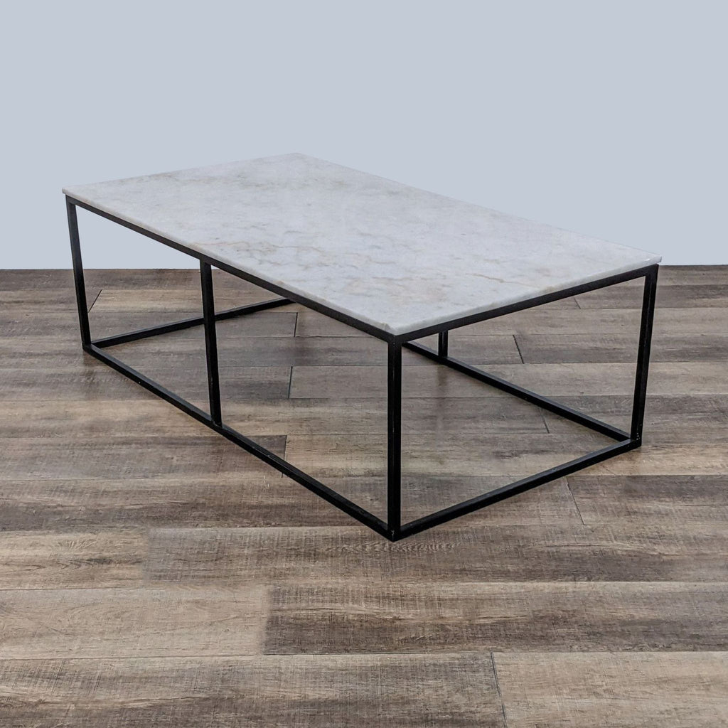 Reperch coffee table with sturdy metal box frame on wooden flooring, showcasing design.