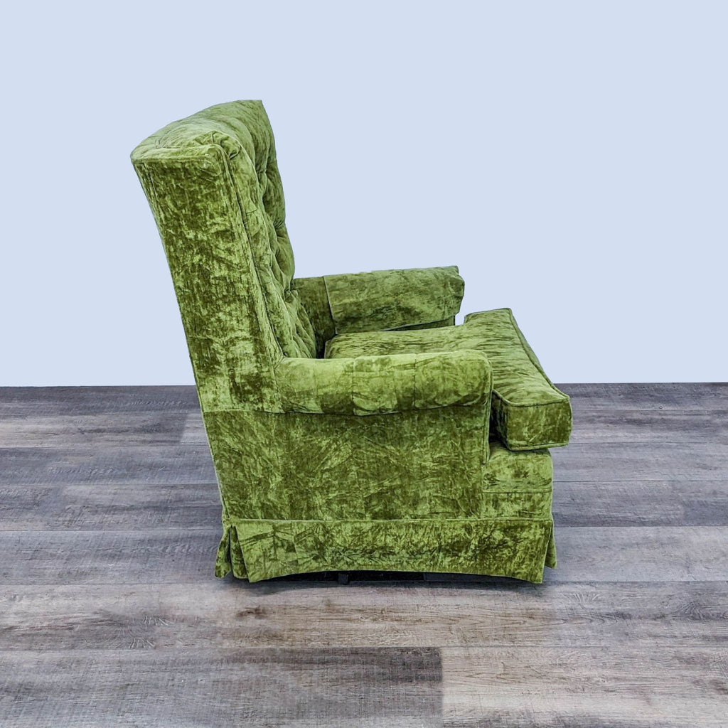 2. Side perspective of a vibrant green tufted velvet armchair from Best Chairs Inc., accentuating the plush armrests.