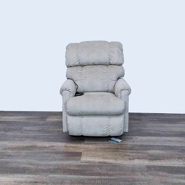 La-Z-Boy Pinnacle Power Recliner closed, showing storage pocket, power controls on right, in upright position on wood floor.