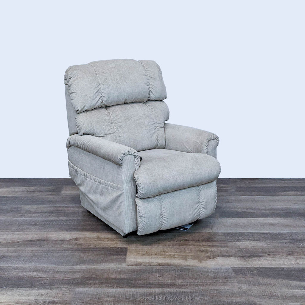La-Z-Boy Pinnacle Power Recliner in neutral position on wood floor, highlighting plush cushions and discreet power controls.