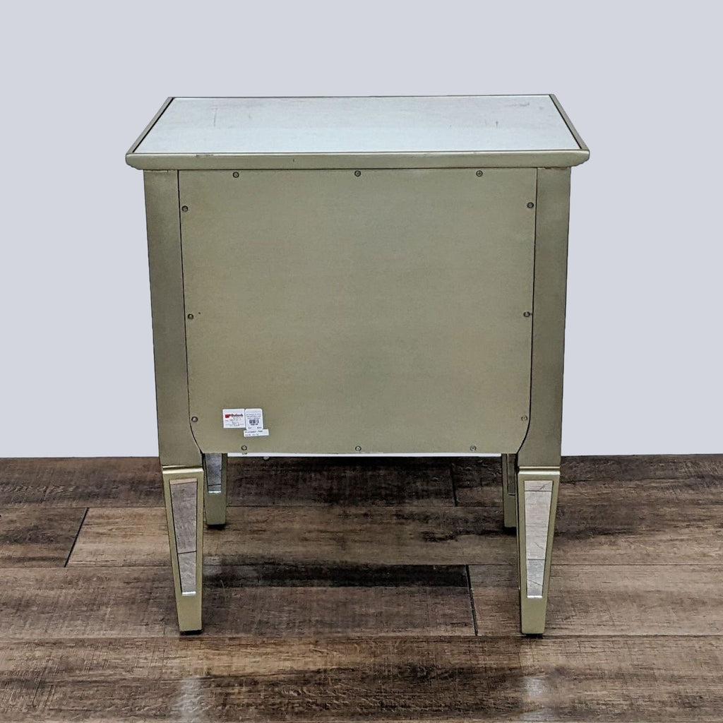 Back view of mirrored end table, highlighting poplar wood legs.