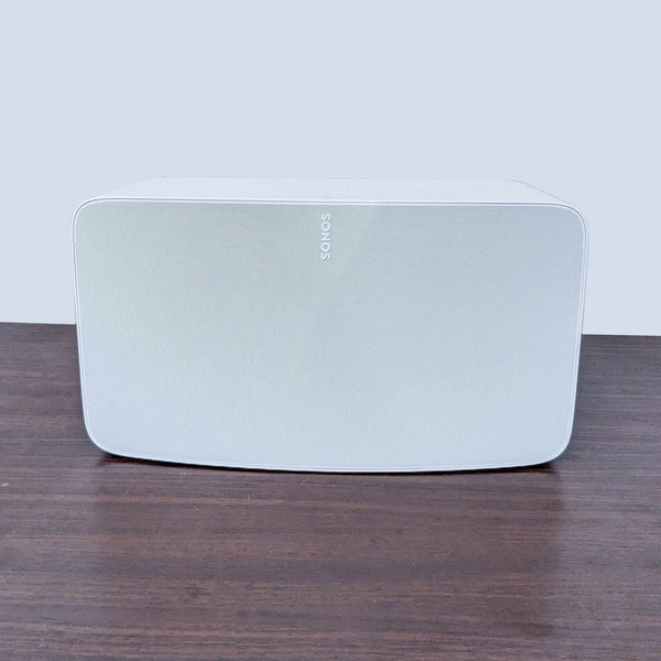 Sonos wireless speaker in white, offering seamless integration and rich audio quality.