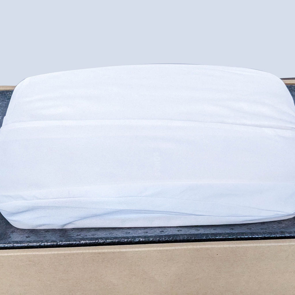 White fabric-covered Sonos speaker emphasizing sleek design and premium sound.