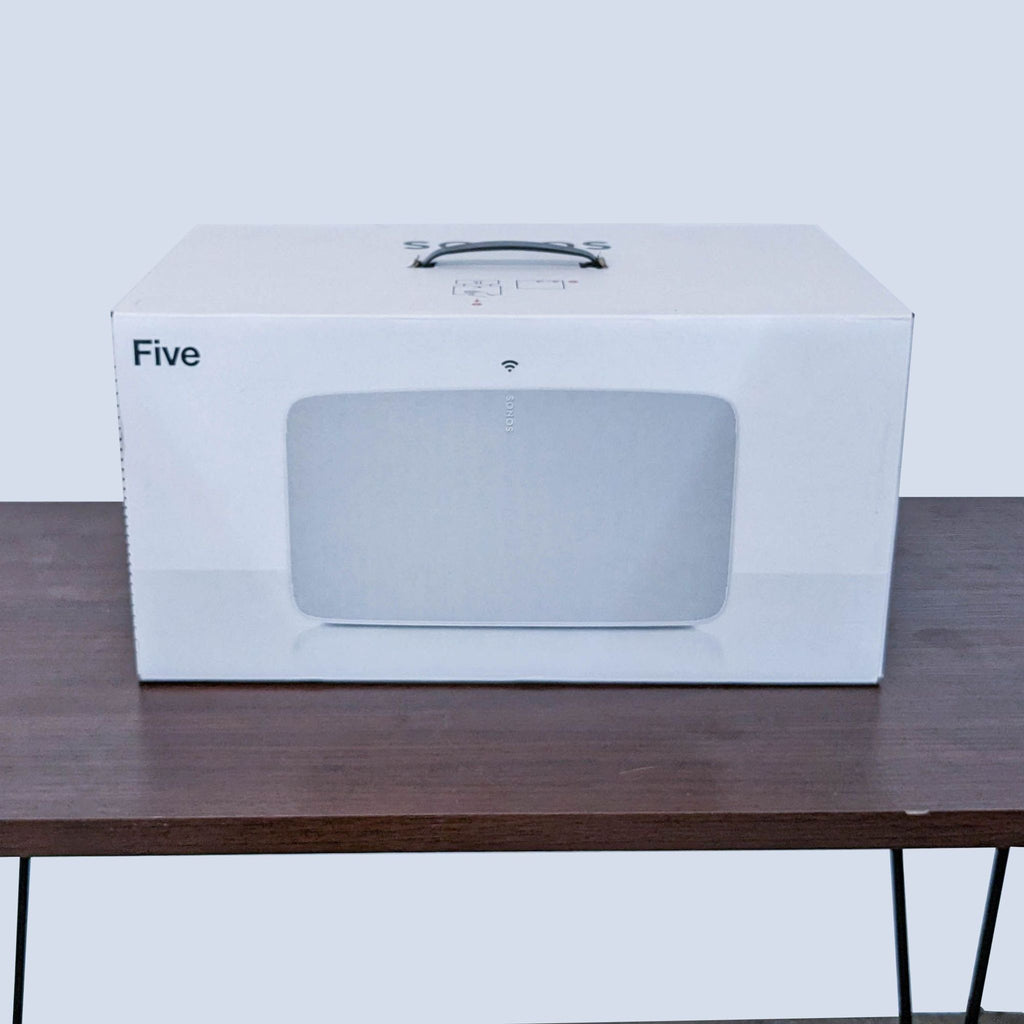 Sonos speaker box with sleek packaging, showcasing elegant design and advanced audio features.