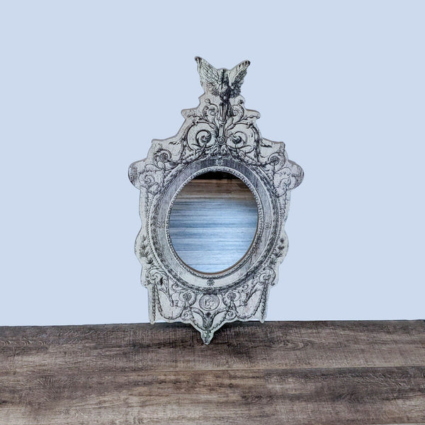 Vintage round mirror with artistic wood frame by Peacock Park.