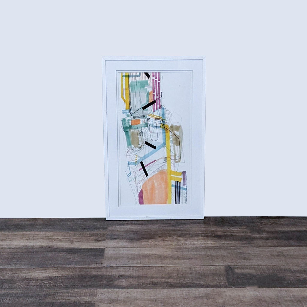 Abstract giclee print in a white frame by Williams Sonoma Home.