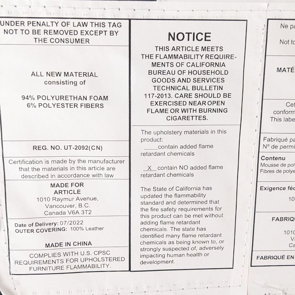 Label for tan leather ottoman, notes flammability standards.