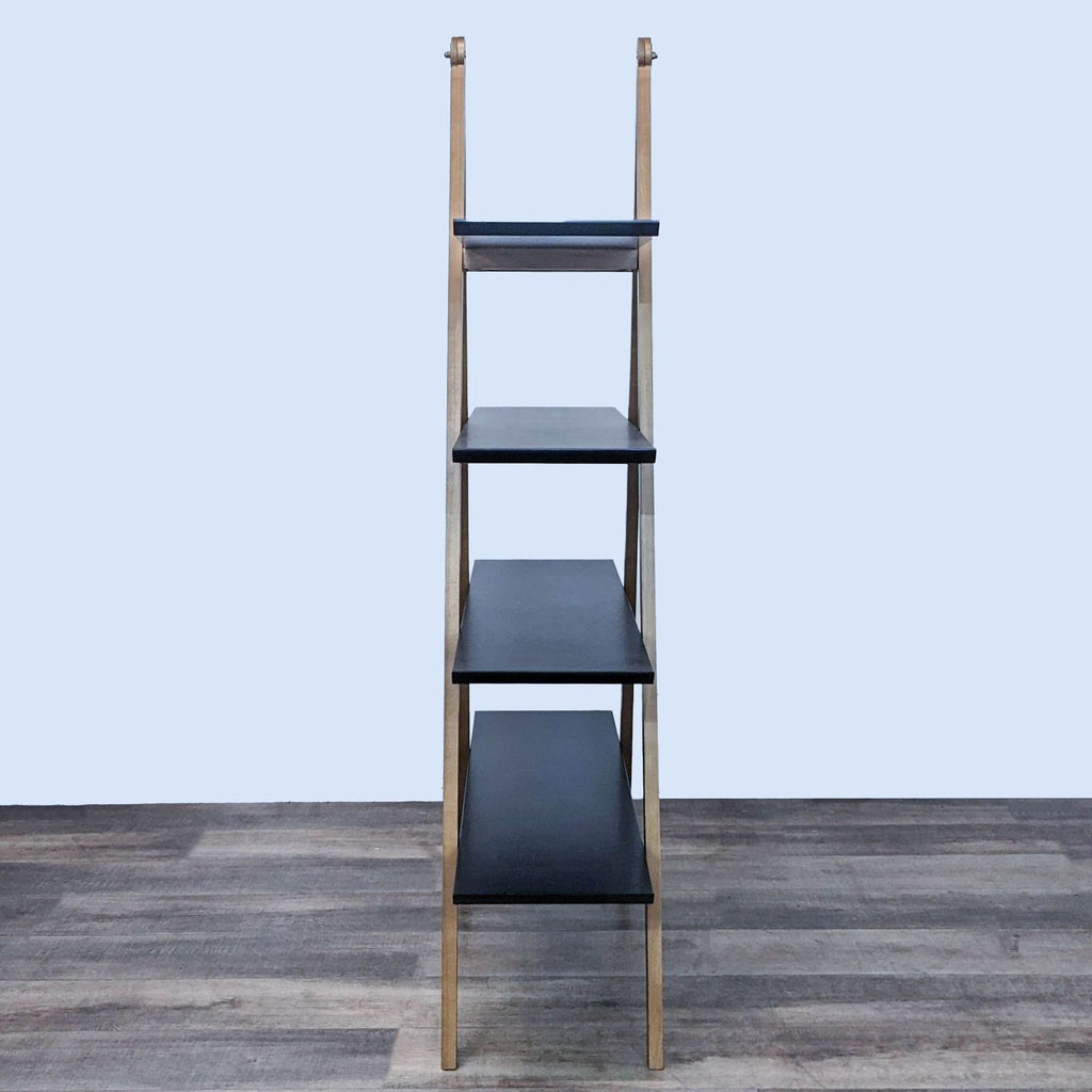 Narrow side view of Article bookshelves showing black shelves and wooden frame, excellent condition, 1.5 years old.