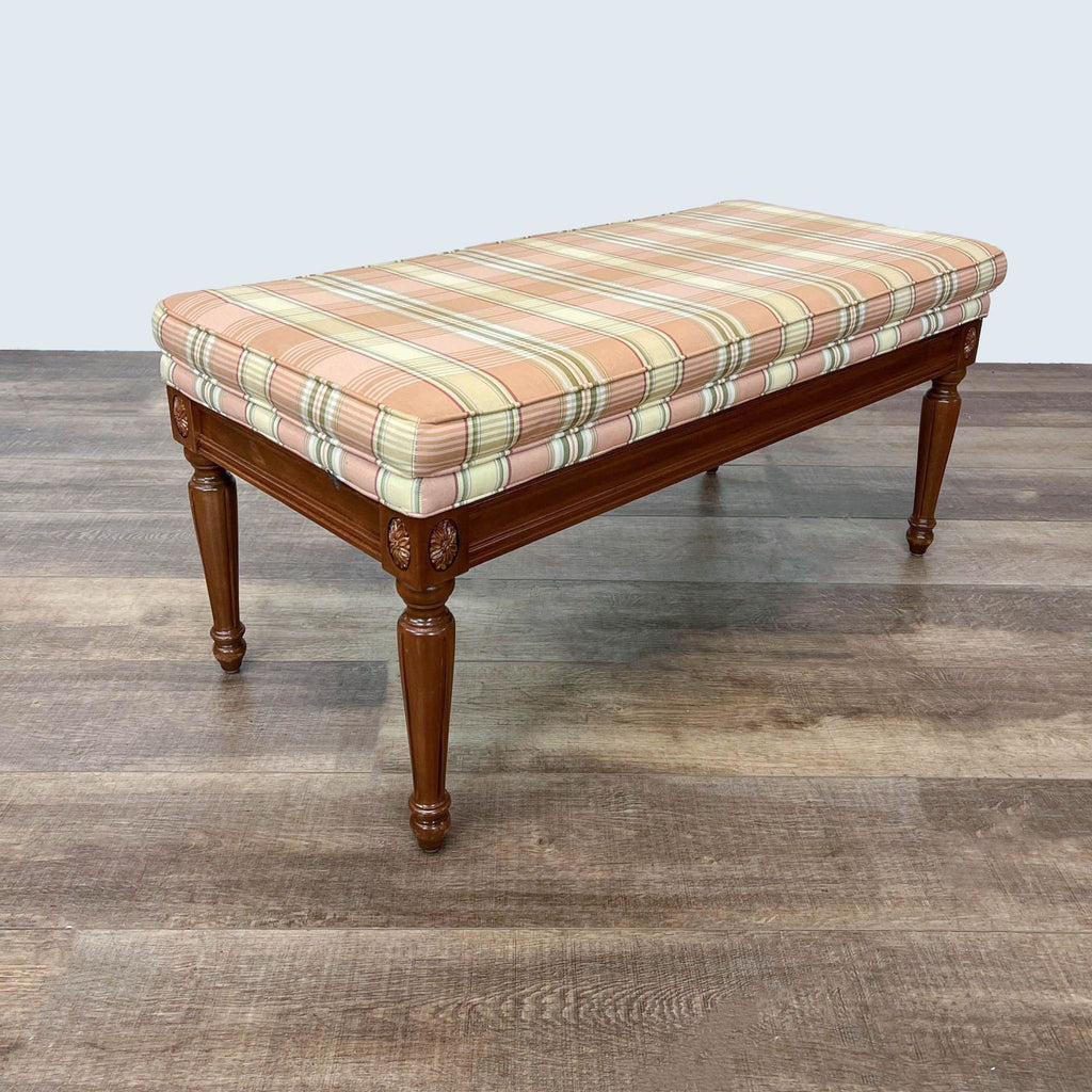 Traditional Ethan Allen 43" wood bench with decorative legs and a patterned, upholstered top.