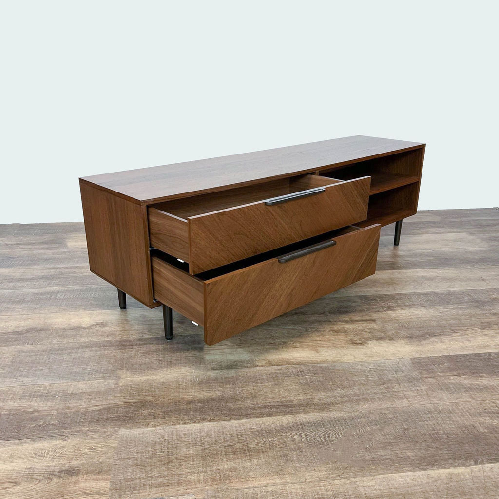 Article brand entertainment center with walnut veneer, open and closed storage spaces visible.