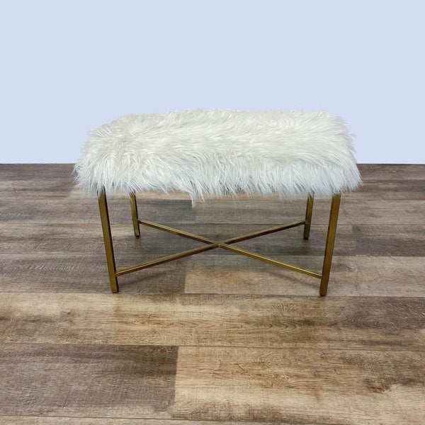 1. A Reperch gold frame metal bench with an off-white fur padded seat, presented against a wood floor.
