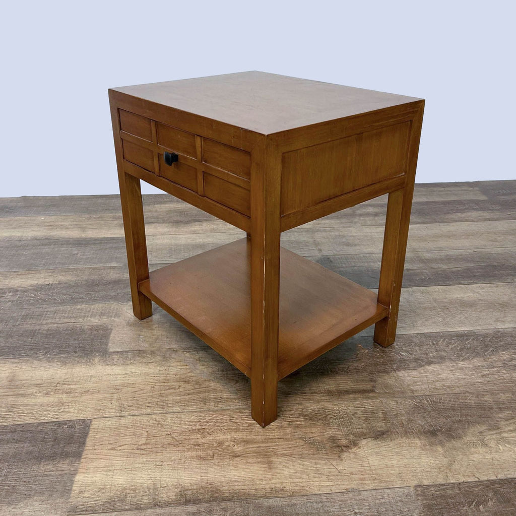 Functional end table from Crate & Barrel with storage drawer and shelf.