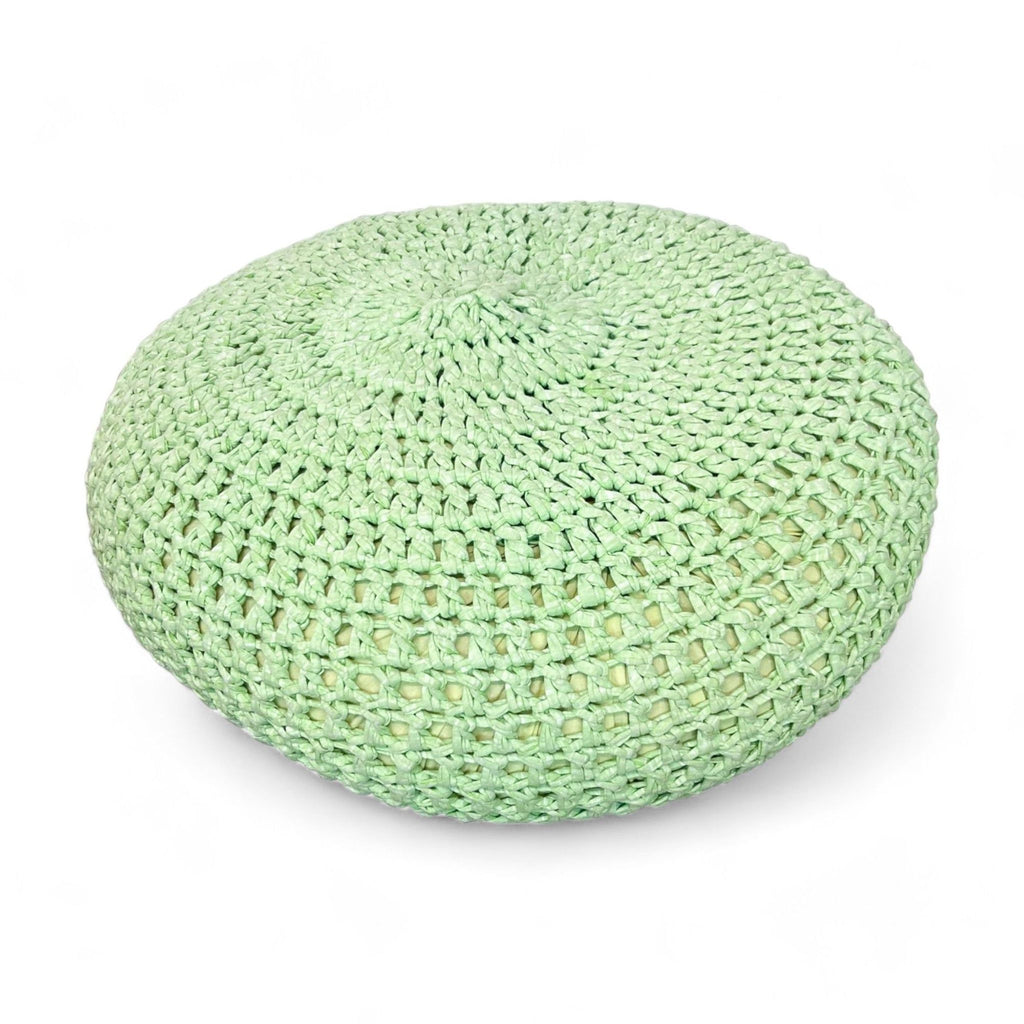 Green woven pouf ottoman by Reperch, displayed on a plain background.