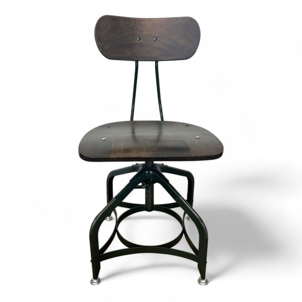 Front view of vintage Toledo chair with steel base and adjustable backrest.