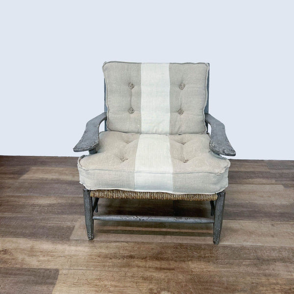 1. Front view of a One King's Lane rustic lounge chair with weathered wood frame and two-toned linen button-tufted upholstery.