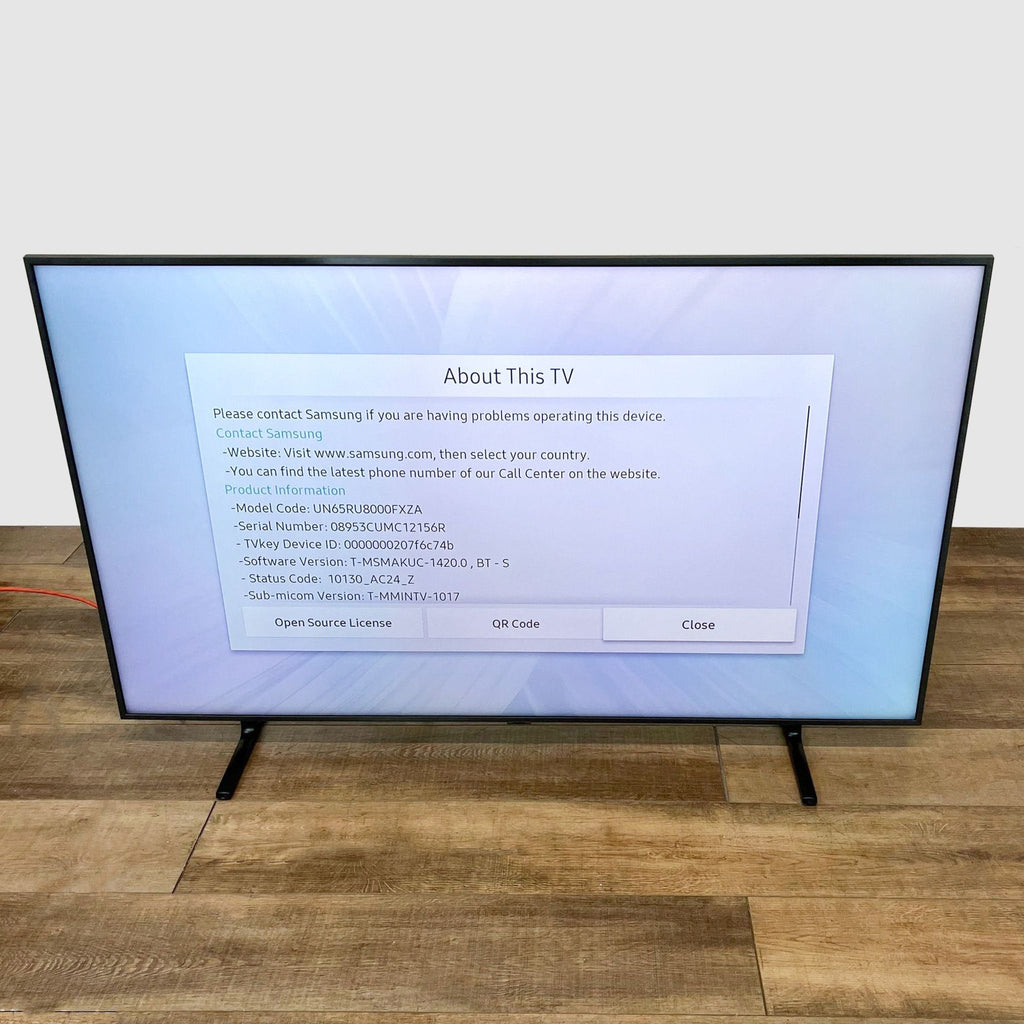 Samsung Large Screen HD Television with Sleek Design and Stand