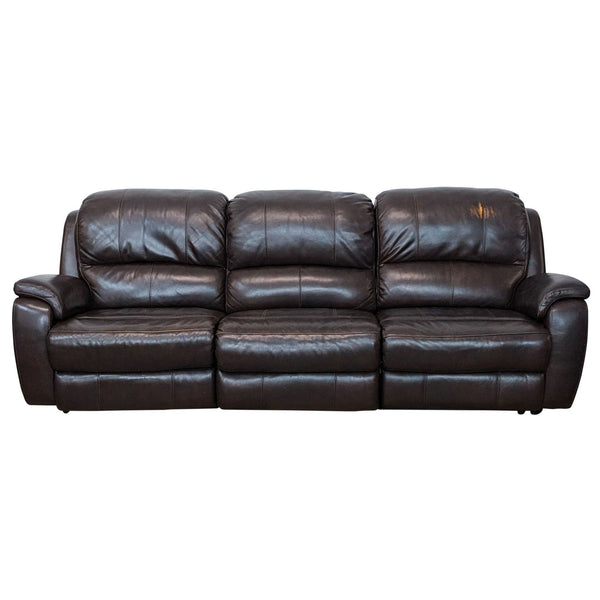 Reperch 3-seat leather sofa with a sturdy frame and plush cushioning, featuring two reclining end seats.