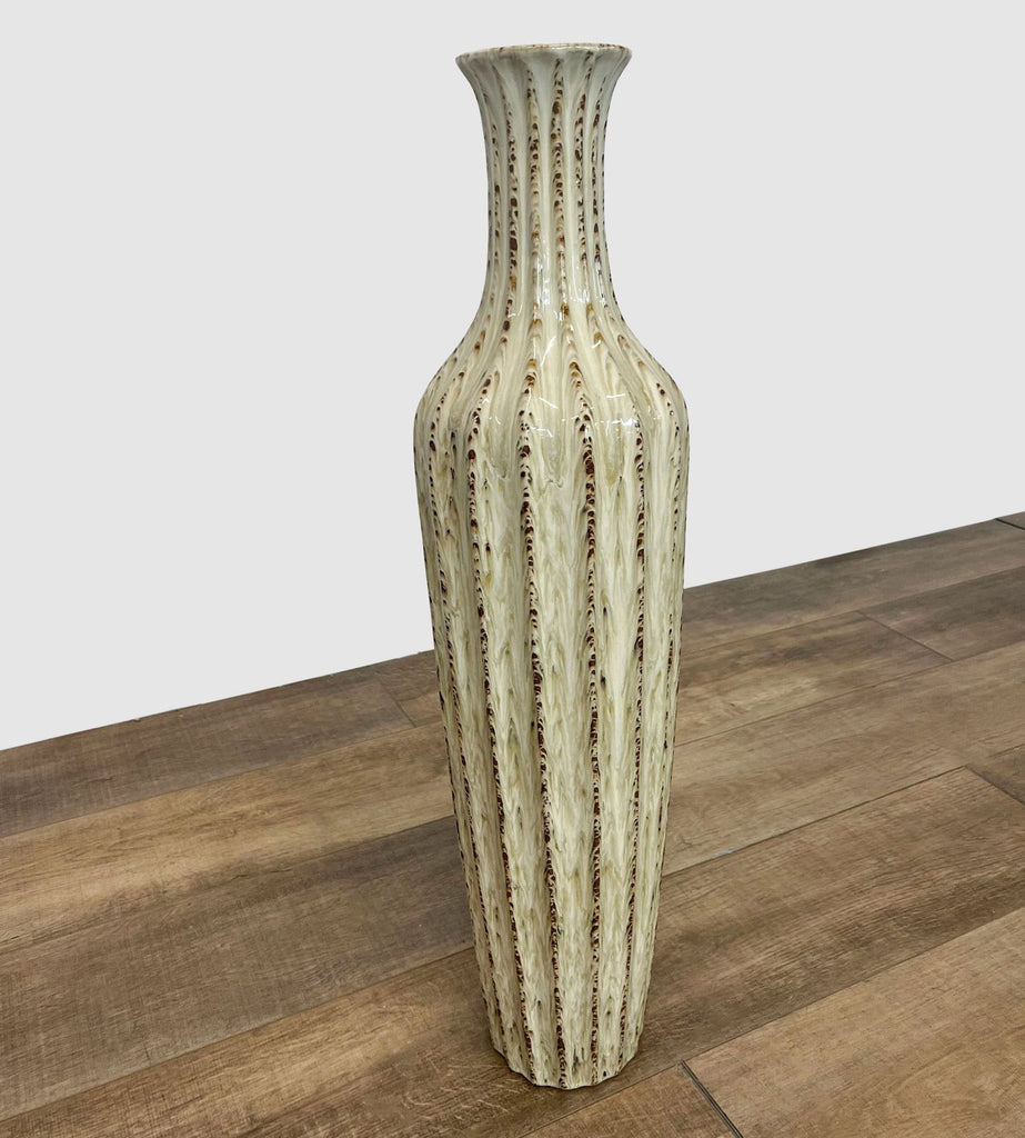 2. Z Gallerie decorative vase on a wooden floor exhibiting its tall, slender form.